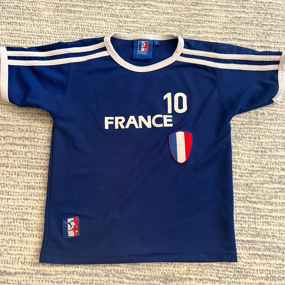 France jersey- tagged size 8 but European football sizing is small. Some snags.